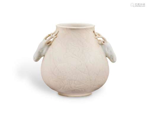 A SMALL INCISED WHITE-GLAZED `DEER' VASE, HU China...