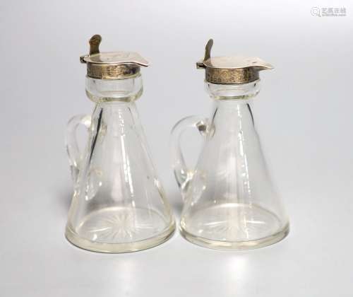 A pair of George V silver mounted glass whisky tots (one a.f...