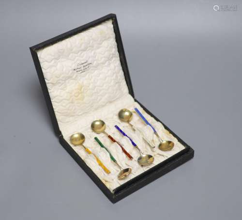 A cased set of six Norwegian gilt white metal and enamel cof...