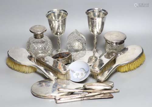 A Georg V hammered silver ten piece dressing table set, engr...