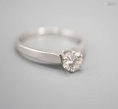 A modern white metal and solitaire diamond ring, size M, gro...