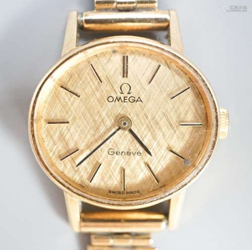 A ladys 1970s 9ct gold Omega manual wind wrist watch, on a 9...