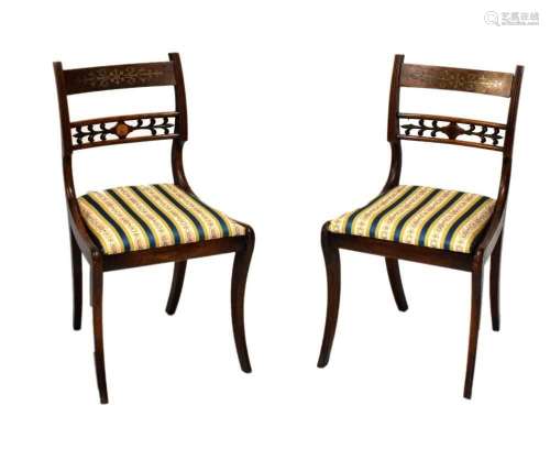Pair of Regency sabre leg chairs