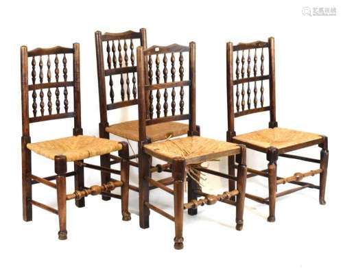 Set of four oak spindle back chairs