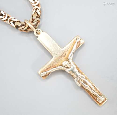 A 9ct gold crucifix pendant, 37mm, on a 9ct gold chain, 47cm...