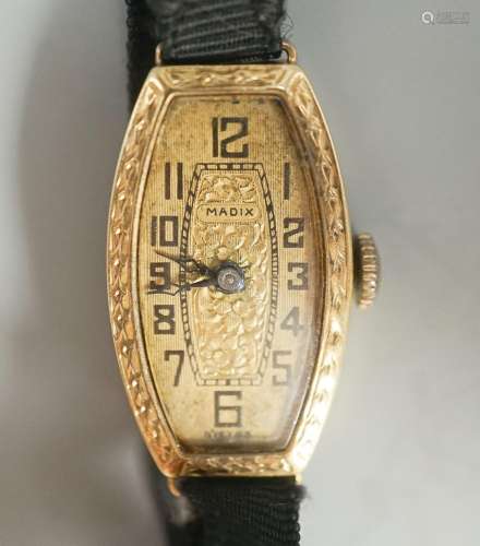 A ladys early 20th century 18ct gold manual wind wrist watch...