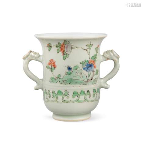A BELL SHAPED TWO-HANDLED PORCELAIN CUP China, Qing Dynasty,...