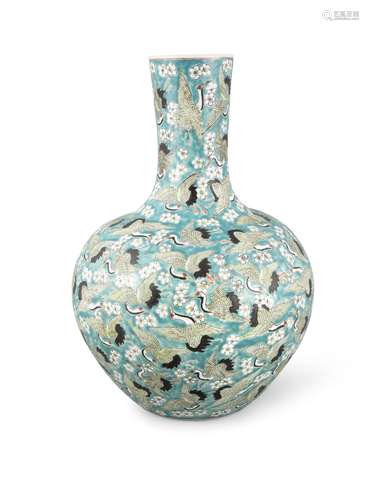 A TURQUOISE GROUND ‘HUNDRED CRANES’ PORCELAIN BOTTLE VASE, T...