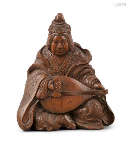 A WOODEN CARVING / OKIMONO OF THE GODDESS BENTEN PLAYING THE...