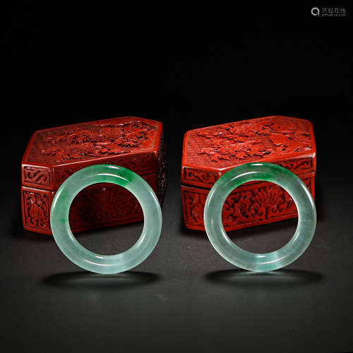 A PAIR OF CHINESE JADE BRACELETS FROM THE QING DYNASTY