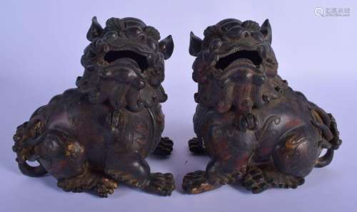 A PAIR OF CHINESE BRONZE BUDDHISTIC LIONS AND COVERS 20th Ce...