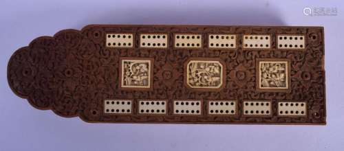 A MID 19TH CENTURY CHINESE CARVED SANDALWOOD AND IVORY CRIBB...
