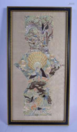 AN EARLY 20TH CENTURY CHINESE SILK EMBROIDERED PEACOCK PANEL...