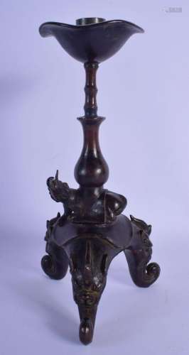 A 17TH/18TH CENTURY CHINESE BRONZE CANDLESTICK Late Ming/Qin...