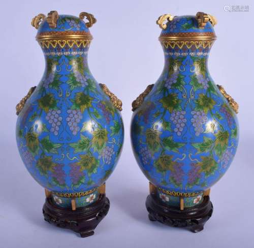A FINE PAIR OF EARLY 20TH CENTURY CHINESE CLOISONNÉ ENAMEL V...