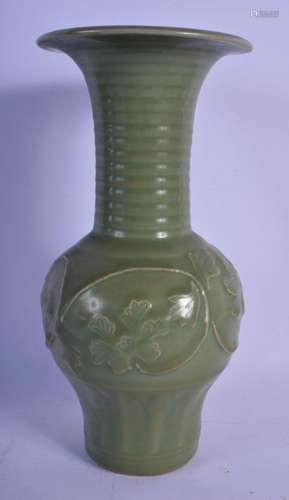 A CHINESE QING DYNASTY CELADON STONEWARE RIBBED VASE decorat...