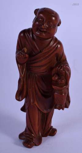 A FINE 19TH CENTURY CHINESE CARVED BOXWOOD FIGURE OF A SCHOL...