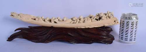 A 19TH CENTURY JAPANESE MEIJI PERIOD CARVED IVORY BOAT model...