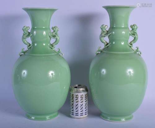 A LARGE PAIR OF 19TH CENTURY CHINESE TWIN HANDLED CELADON VA...