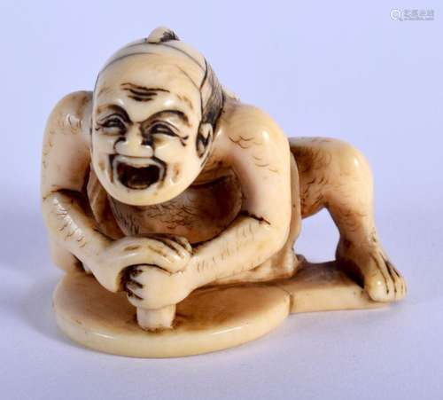 AN 18TH CENTURY JAPANESE EDO PERIOD CARVED IVORY NETSUKE mod...