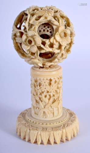 A 19TH CENTURY CHINESE CANTON PUZZLE BALL ON STAND Qing. 12 ...