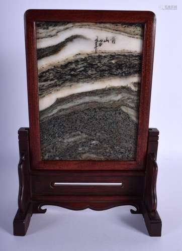 AN EARLY 20TH CENTURY CHINESE CARVED WOOD AND DREAM STONE SC...