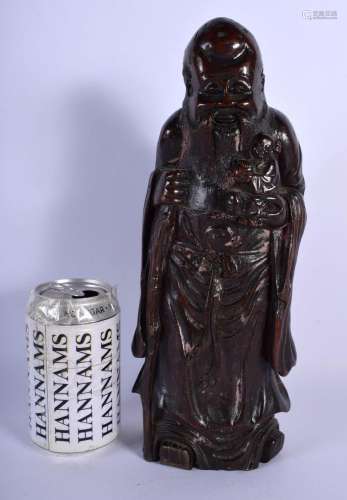 A 19TH CENTURY CHINESE CARVED BAMBOO FIGURE OF SHOU LAO Qing...