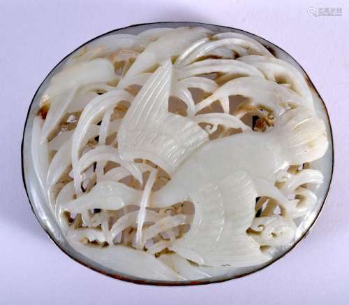 A LARGE 17TH/18TH CENTURY CHINESE CARVED GREENISH WHITE JADE...