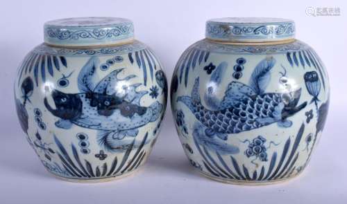A PAIR OF CHINESE BLUE AND WHITE GINGER JARS AND COVERS 20th...