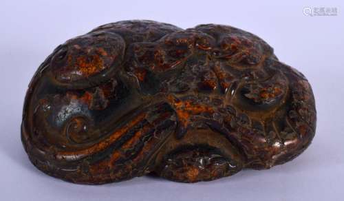 A CHINESE CARVED AMBER TYPE SCHOLARS DRAGON BOULDER 20th Cen...
