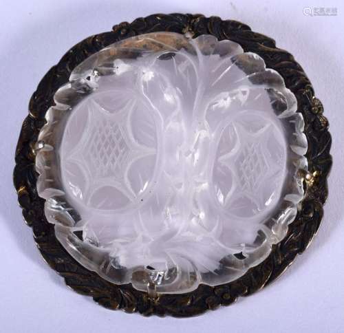 AN EARLY 20TH CENTURY CHINESE CARVED CRYSTAL AND SILVER PEND...