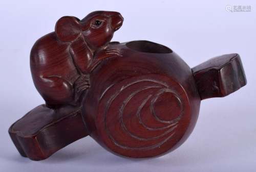 A JAPANESE CARVED BOXWOOD RAT AND HAMMER OKIMONO. 9.5 cm x 6...