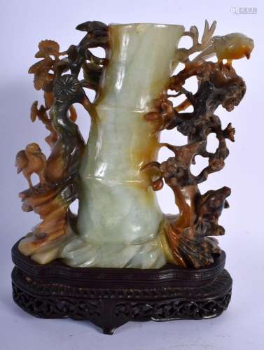AN EARLY 20TH CENTURY CHINESE CARVED TRI COLOUR JADE VASE La...