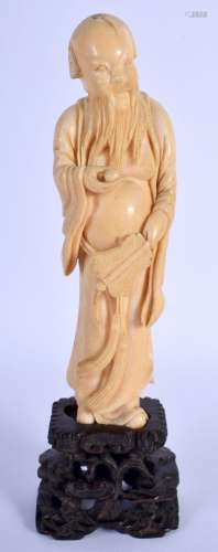 A 19TH CENTURY CHINESE CARVED IVORY FIGURE OF A STANDING MAL...
