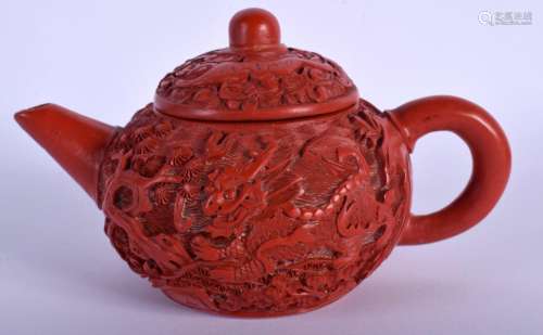 A RARE EARLY 20TH CENTURY CHINESE CINNABAR LACQUER YIXING TE...