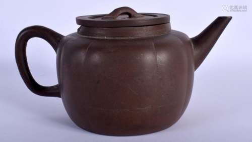 AN EARLY 20TH CENTURY CHINESE CARVED YIXING POTTERY TEAPOT A...