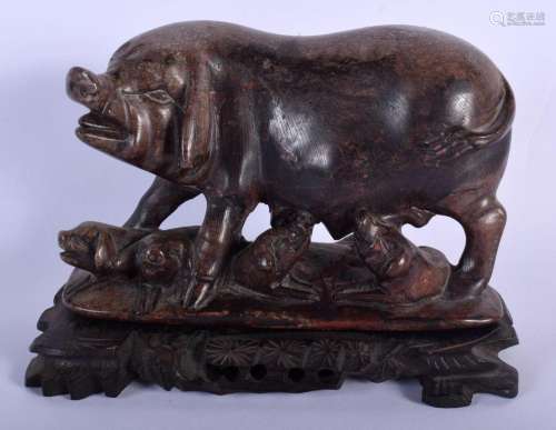 A LATE 19TH CENTURY CHINESE CARVED HARDSTONE FIGURE OF A PIG...