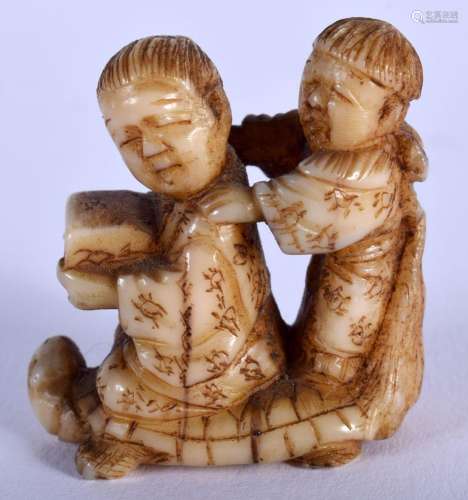 A SMALL 19TH CENTURY JAPANESE MEIJI PERIOD CARVED IVORY NETS...