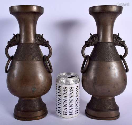 A PAIR OF 19TH CENTURY CHINESE TWIN HANDLED BRONZE VASES Min...