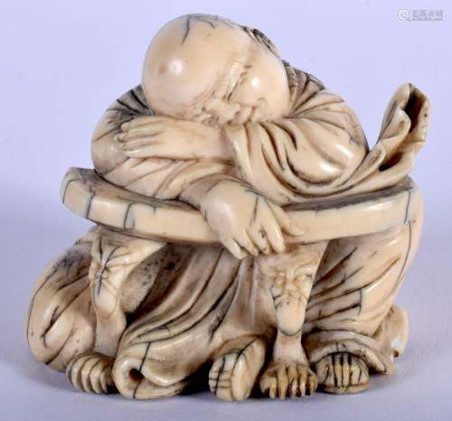 AN 18TH/19TH CENTURY CHINESE CARVED IVORY FIGURE OF A SLEEPI...