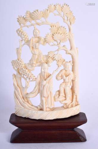 AN EARLY 20TH CENTURY CHINESE CARVED IVORY OPEN WORK MOUNTAI...