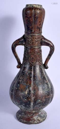 AN UNUSUAL CHINESE TWIN HANDLED BRONZE VASE possibly Early M...