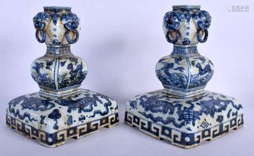 A LARGE PAIR OF CHINESE BLUE AND WHITE PORCELAIN CANDLESTICK...