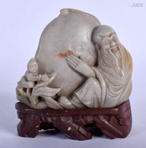 AN EARLY 20TH CENTURY CHINESE CARVED SOAPSTONE PEACH BOULDER...