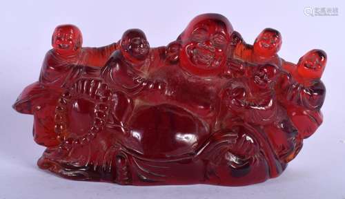 A CHINESE CARVED RED AMBER TYPE FIGURE OF BUDDHAS 20th Centu...