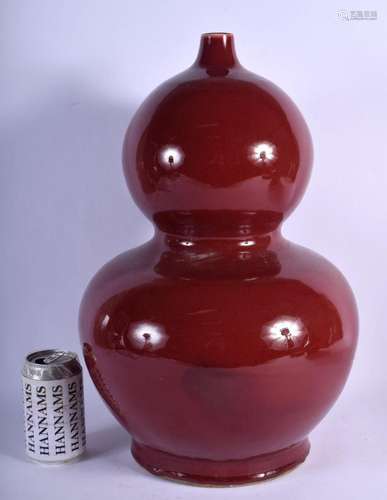 A LARGE CHINESE DOUBLE GOURD RED PORCELAIN VASE 20th Century...