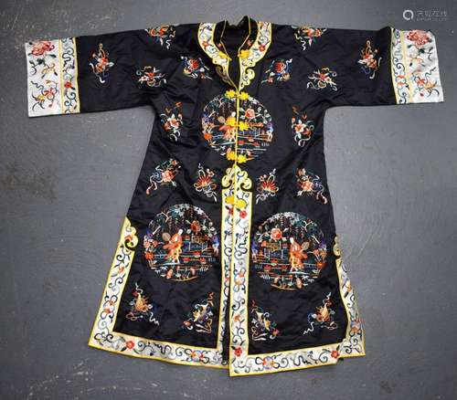 AN EARLY 20TH CENTURY CHINESE BLACK SILK WORK JACKET decorat...