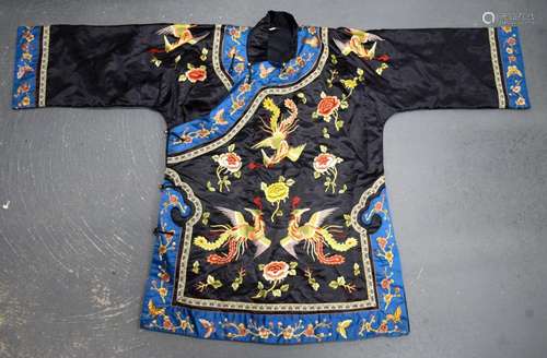 AN EARLY 20TH CENTURY CHINESE BLACK SILK WORK JACKET decorat...