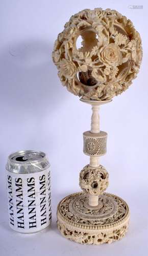 A LARGE 19TH CENTURY CHINESE CANTON IVORY PUZZLE BALL ON STA...