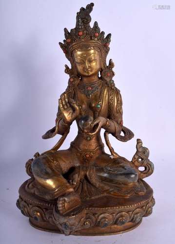 A CHINESE TIBETAN JEWELLED BRONZE FIGURE OF A GOD 20th Centu...